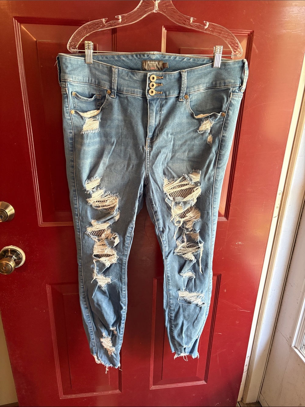 Torrid ripped fishnet jeans